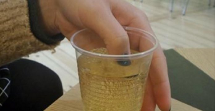 A woman put her nail into a drink in a nightclub - when it changed color, she immediately called the police