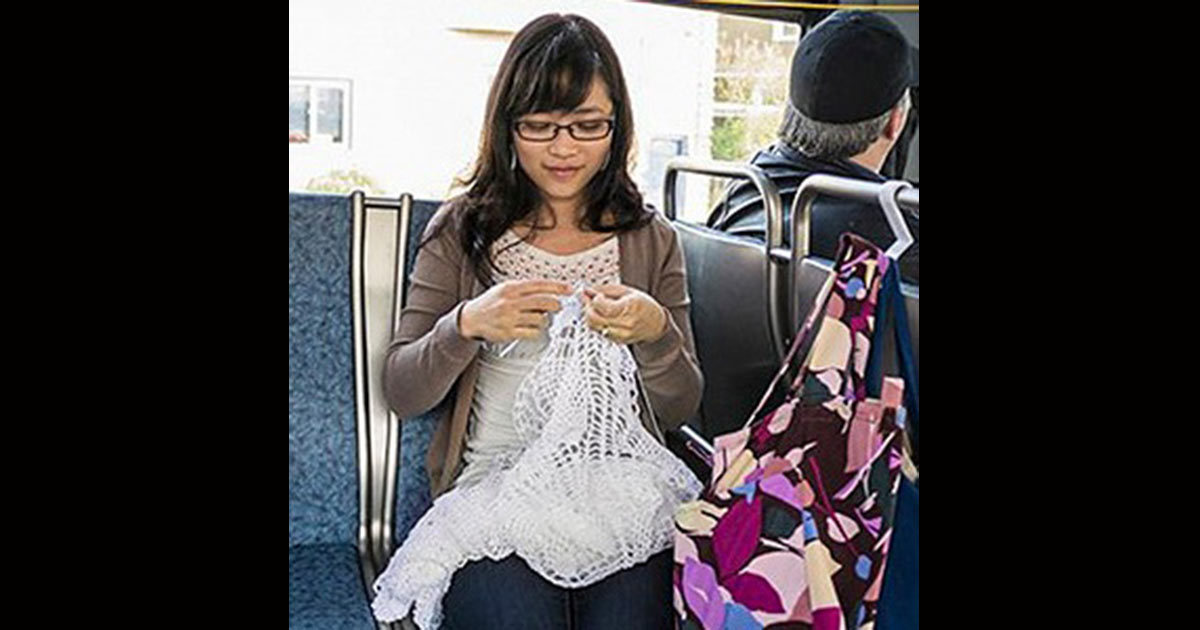 For five months she knitted her wedding dress on the bus ride to work, and the result is simply stunning!