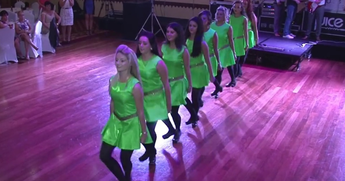 8 bridesmaids dance a traditional Irish dance, but watch what happens when the groom joins