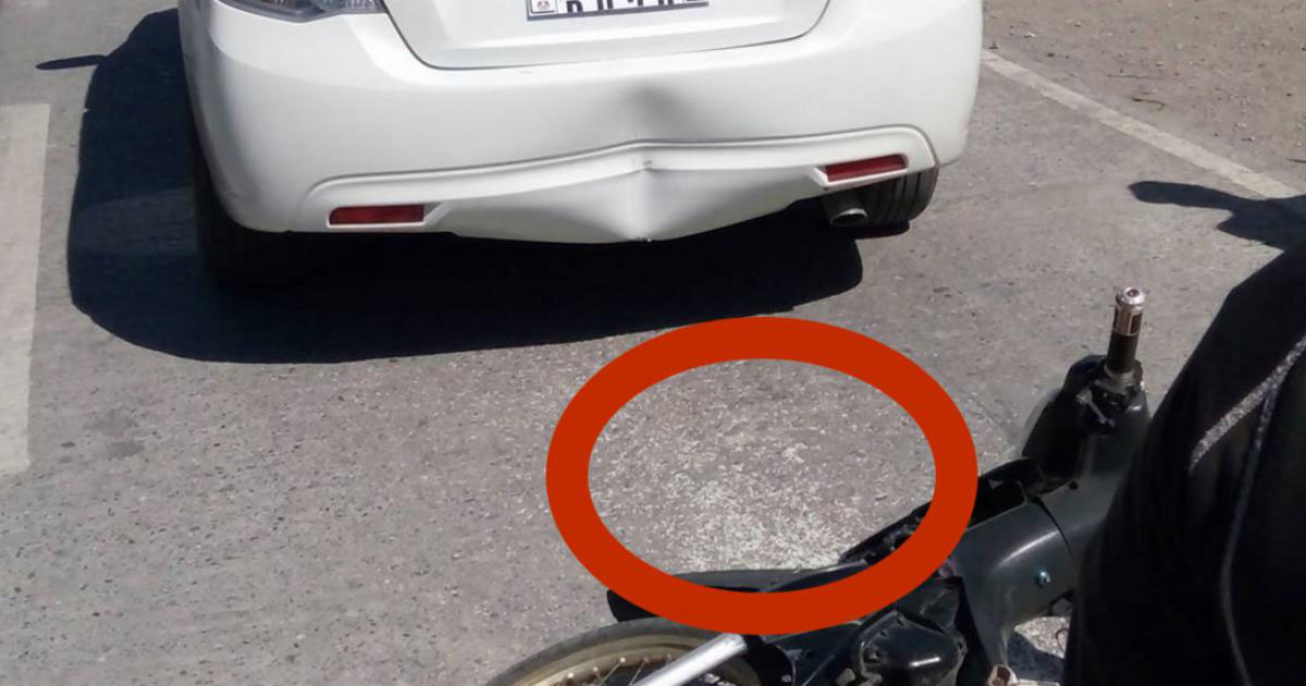Driver got furious when motorcyclist collided with his car - but then looked at the floor and immediately started crying