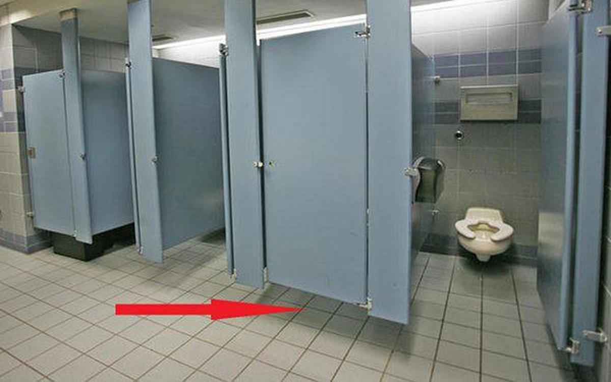 Ever wondered why public bathroom doors don't reach the floor? turns out there's a reason